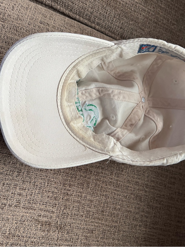 White Baseball Cap With Green Embroidered Logo